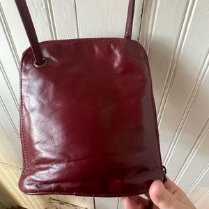 Latico Lotus Leather Crossbody in the color burgundy
